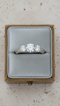 Three-stone platinum anniversary ring